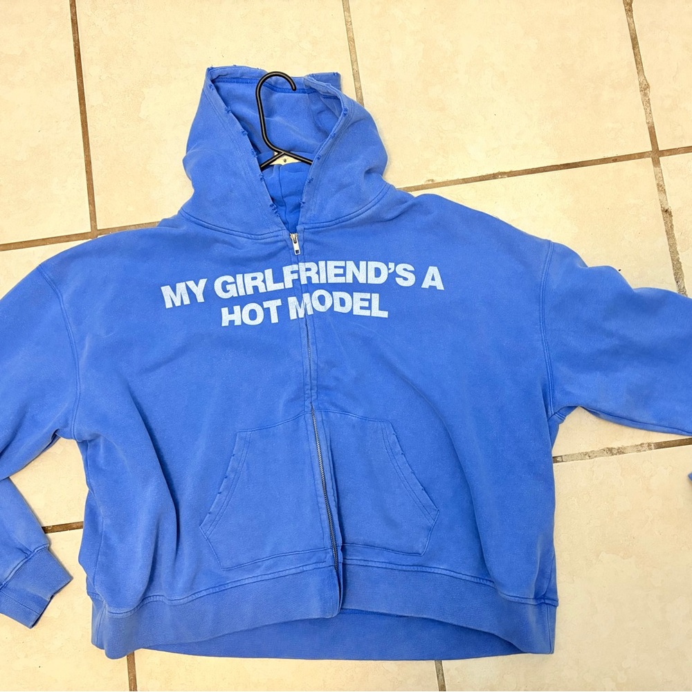 Blue Hoodie with Bold Text